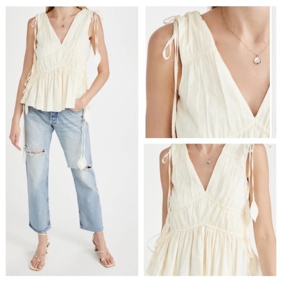 Tory Burch
Sleeveless Smocked Peplum Top COLOR New Ivory size 0 - Picture 4 of 17